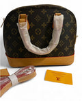 Louis Vuitton Alma Manogram Hanbag